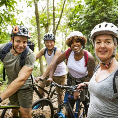 group-friends-out-bicycling-together